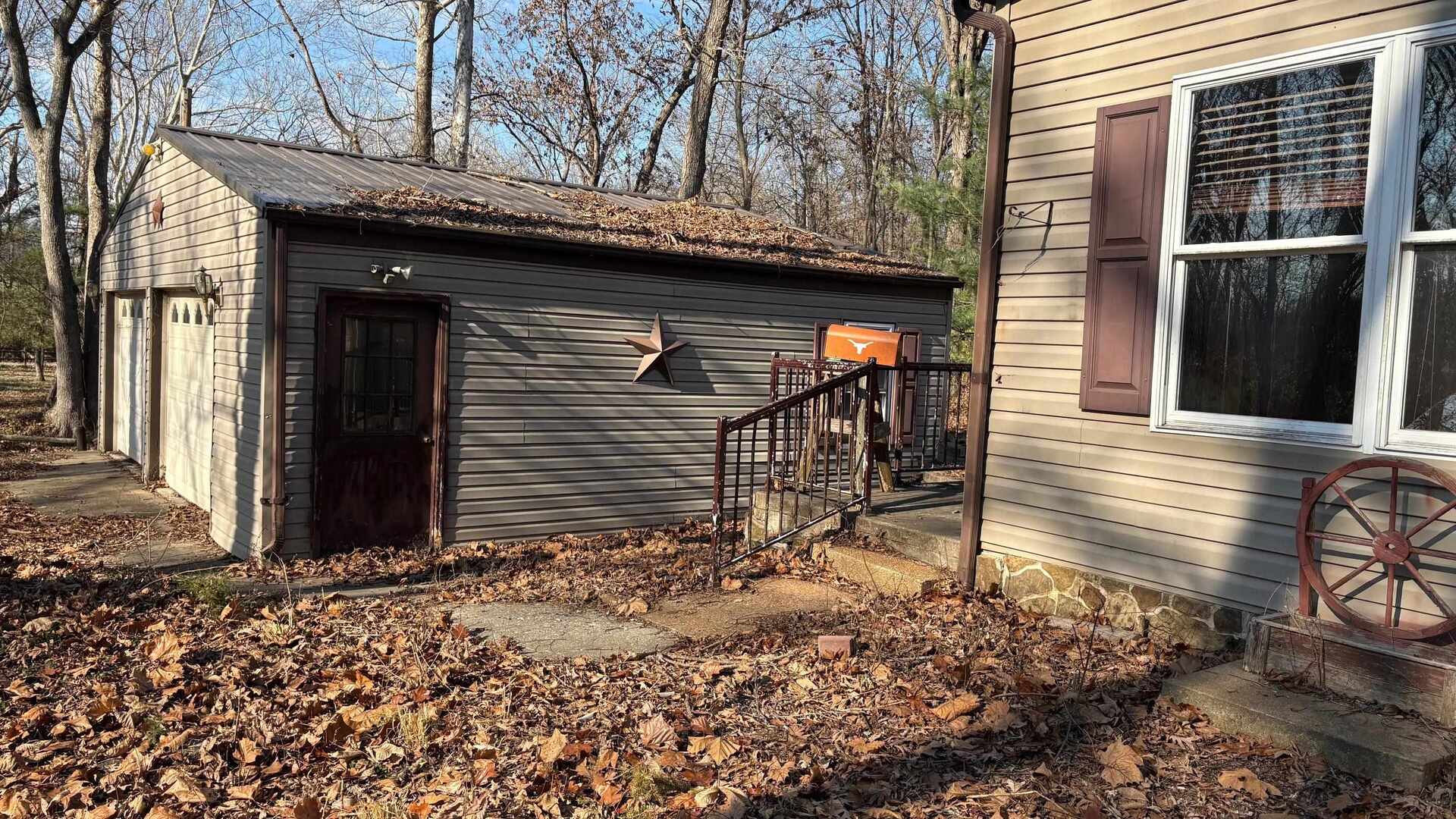 2954 Cardinals Lane Chester, IL 62233 - Photo 22 of 32 a view of a house with a yard and garage
