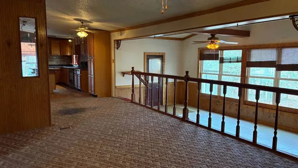 a view of hallway with stairs