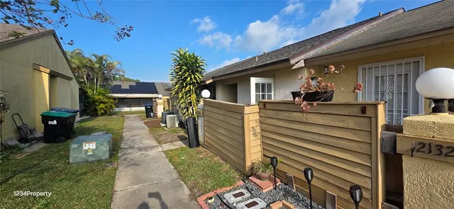 a view of a porch with furniture
