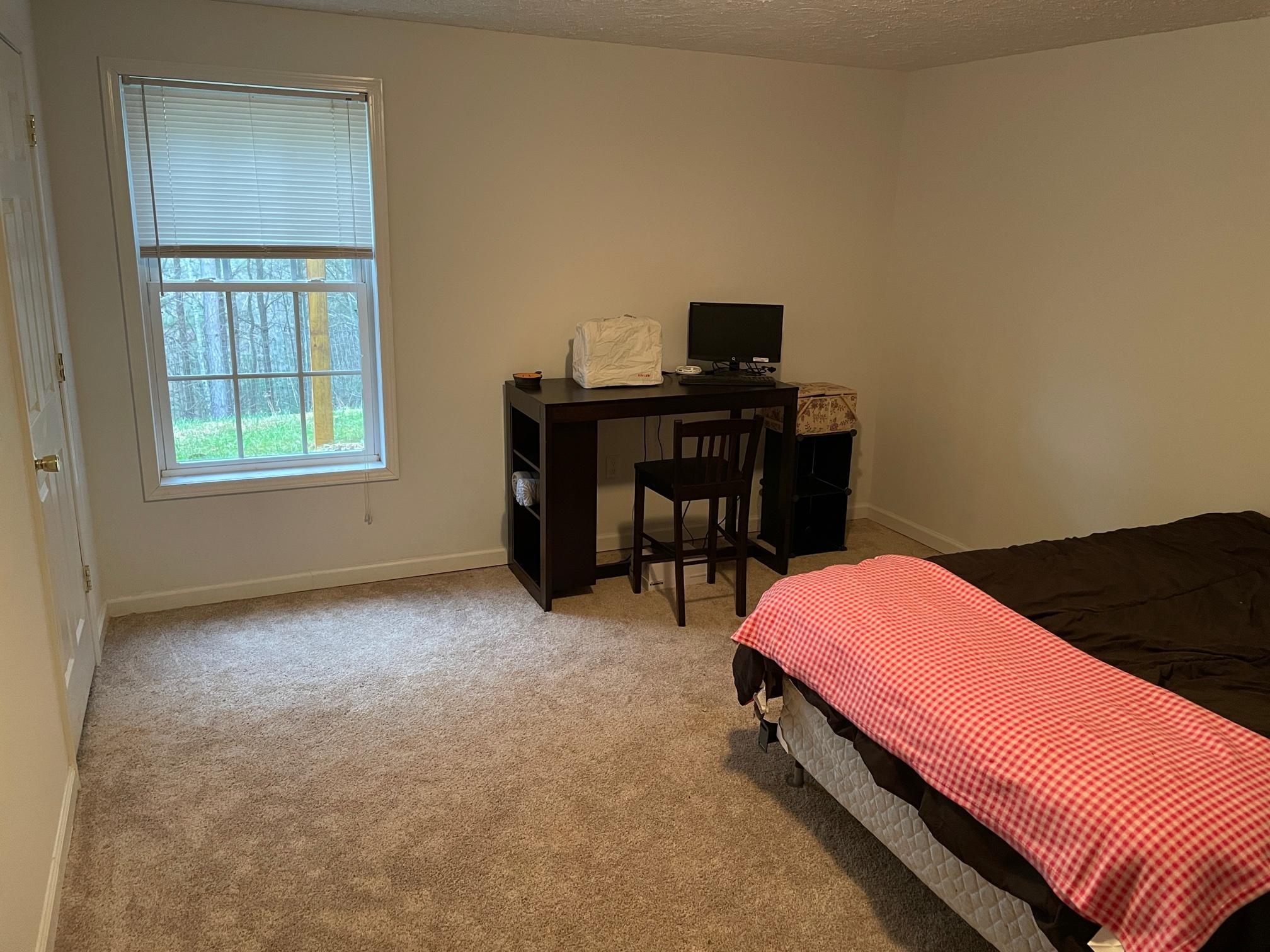 778 Holland Road Callaway, VA 24067 - Photo 17 of 27 a bed room with a bed and a window