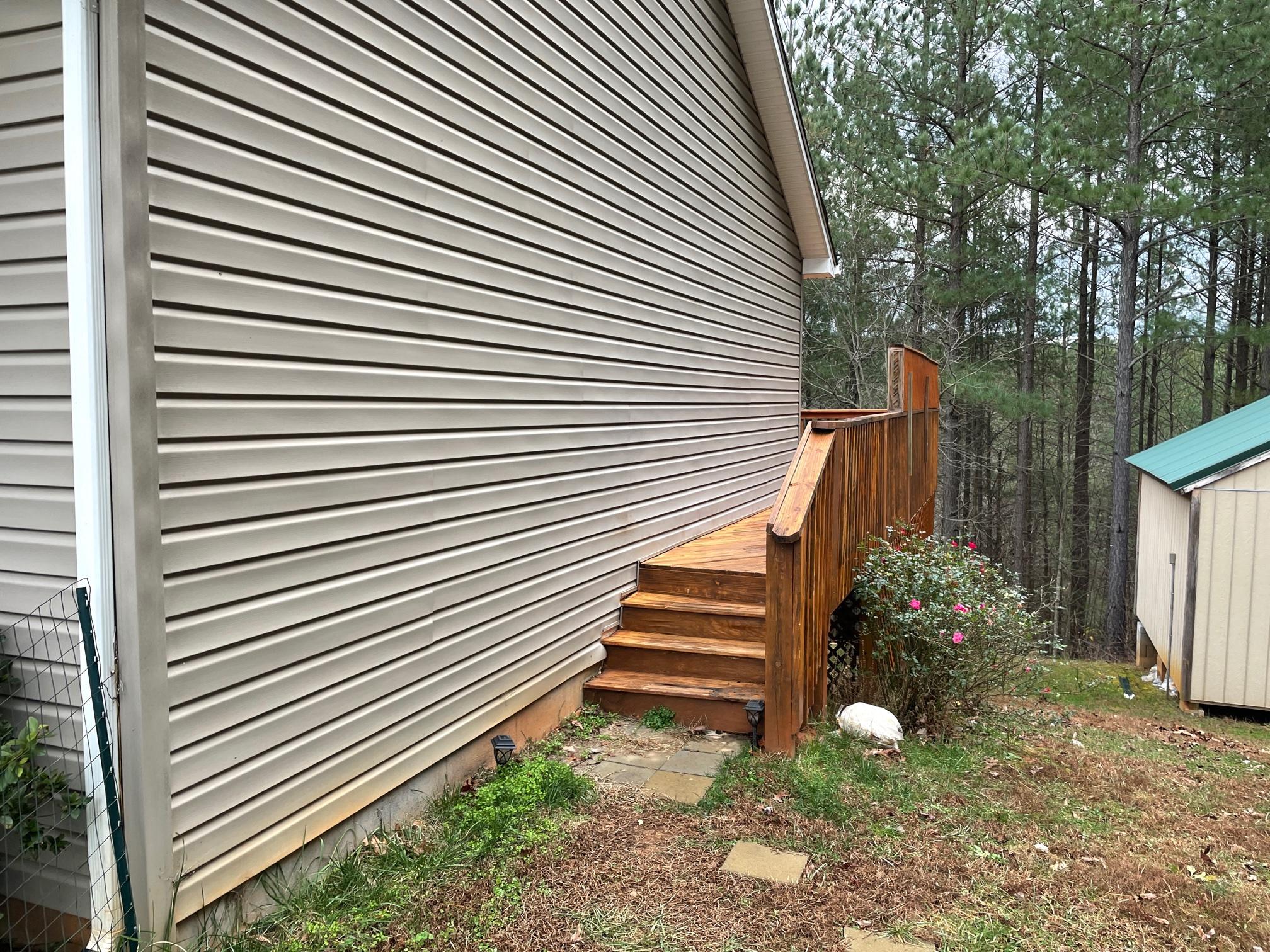 778 Holland Road Callaway, VA 24067 - Photo 24 of 27 a view of a back yard with a chair