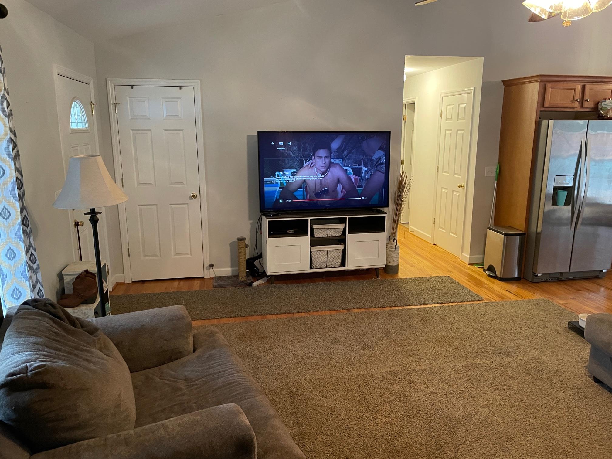 778 Holland Road Callaway, VA 24067 - Photo 5 of 27 a living room with furniture and a flat screen tv