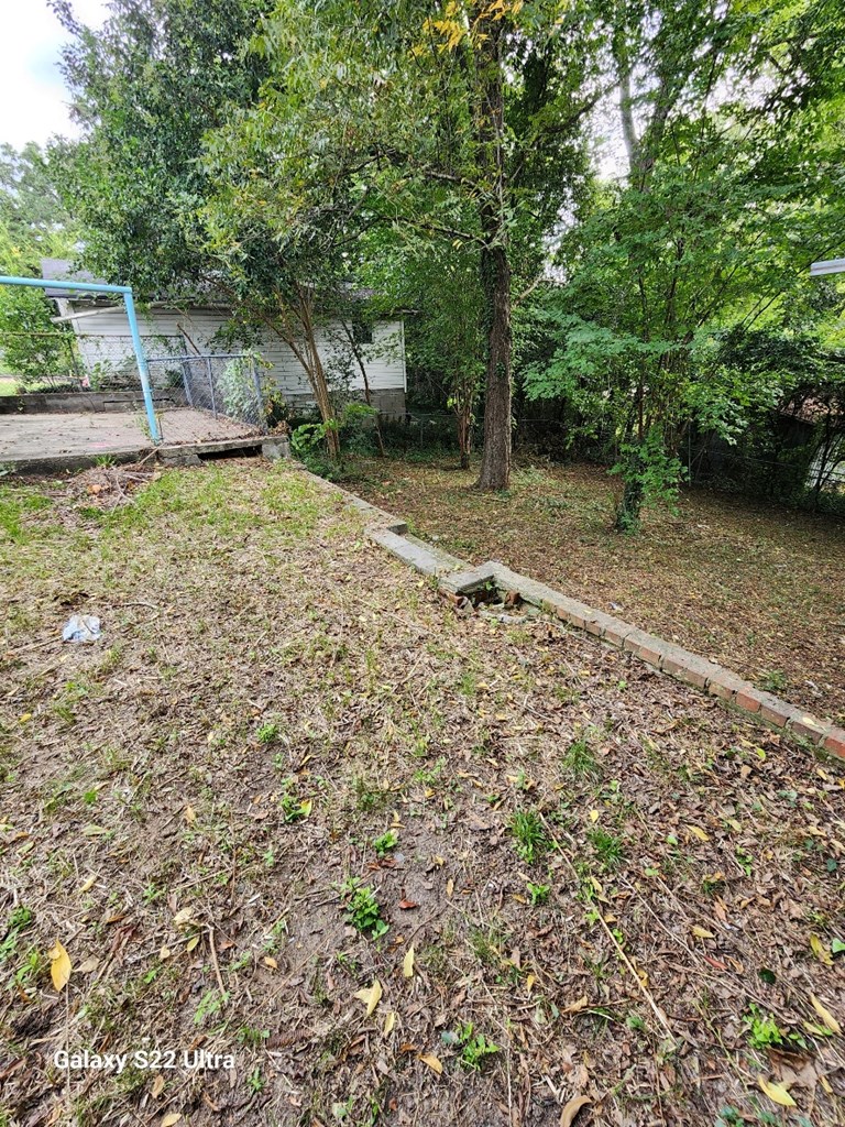 5118 11th Avenue Columbus, GA 31904 - Photo 11 of 12 a backyard of a house with lots of green space