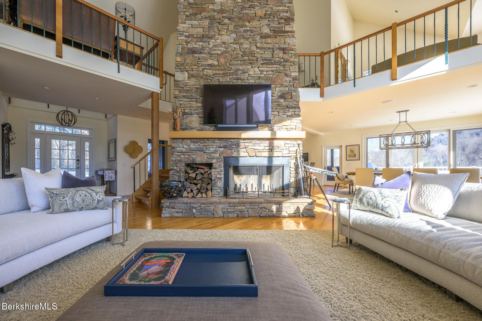 83 Maple Hill Road West Stockbridge, MA 01266 - Photo 16 of 86 a living room with furniture and a fireplace