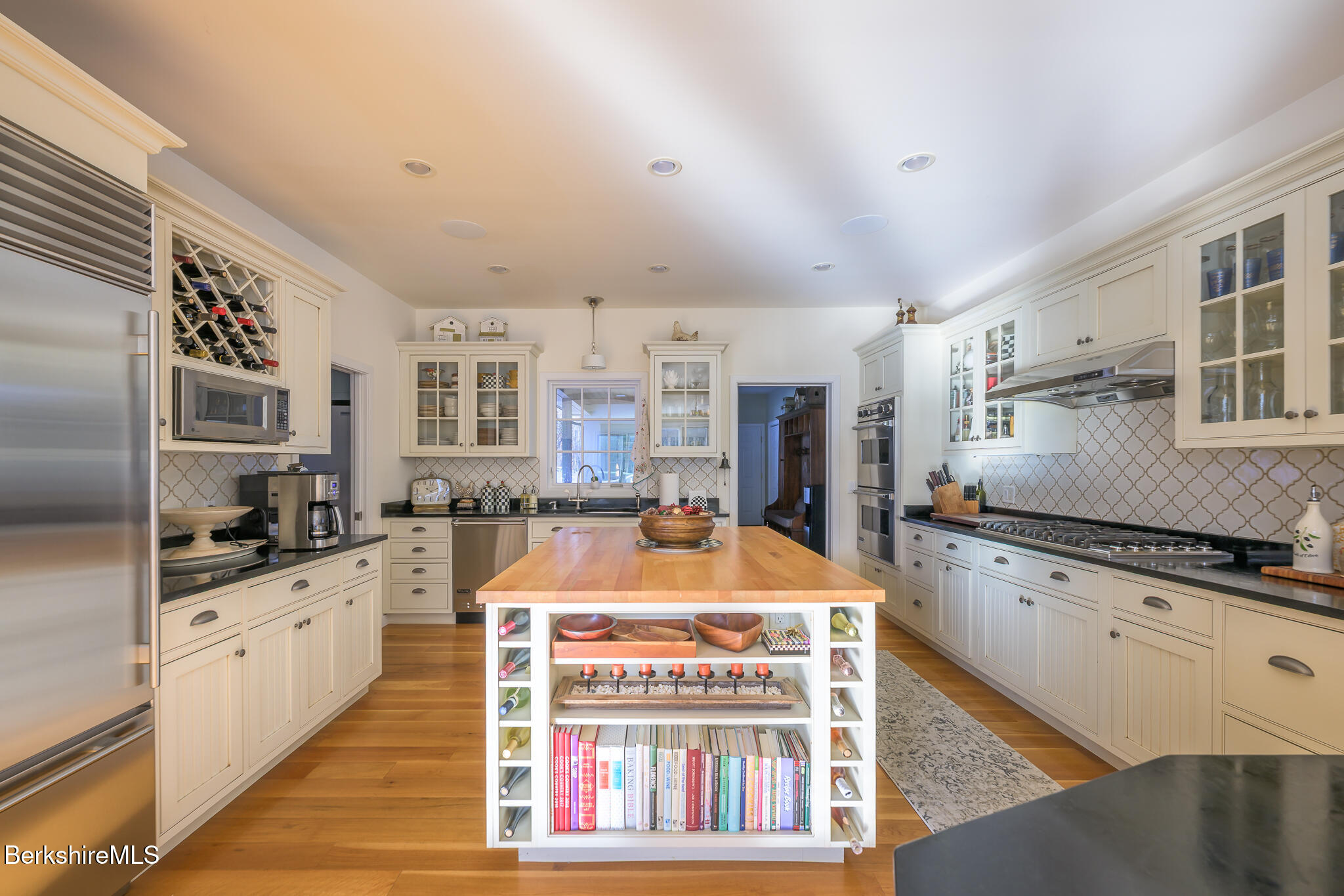 83 Maple Hill Road West Stockbridge, MA 01266 - Photo 22 of 86 a kitchen with granite countertop a stove a sink and a refrigerator