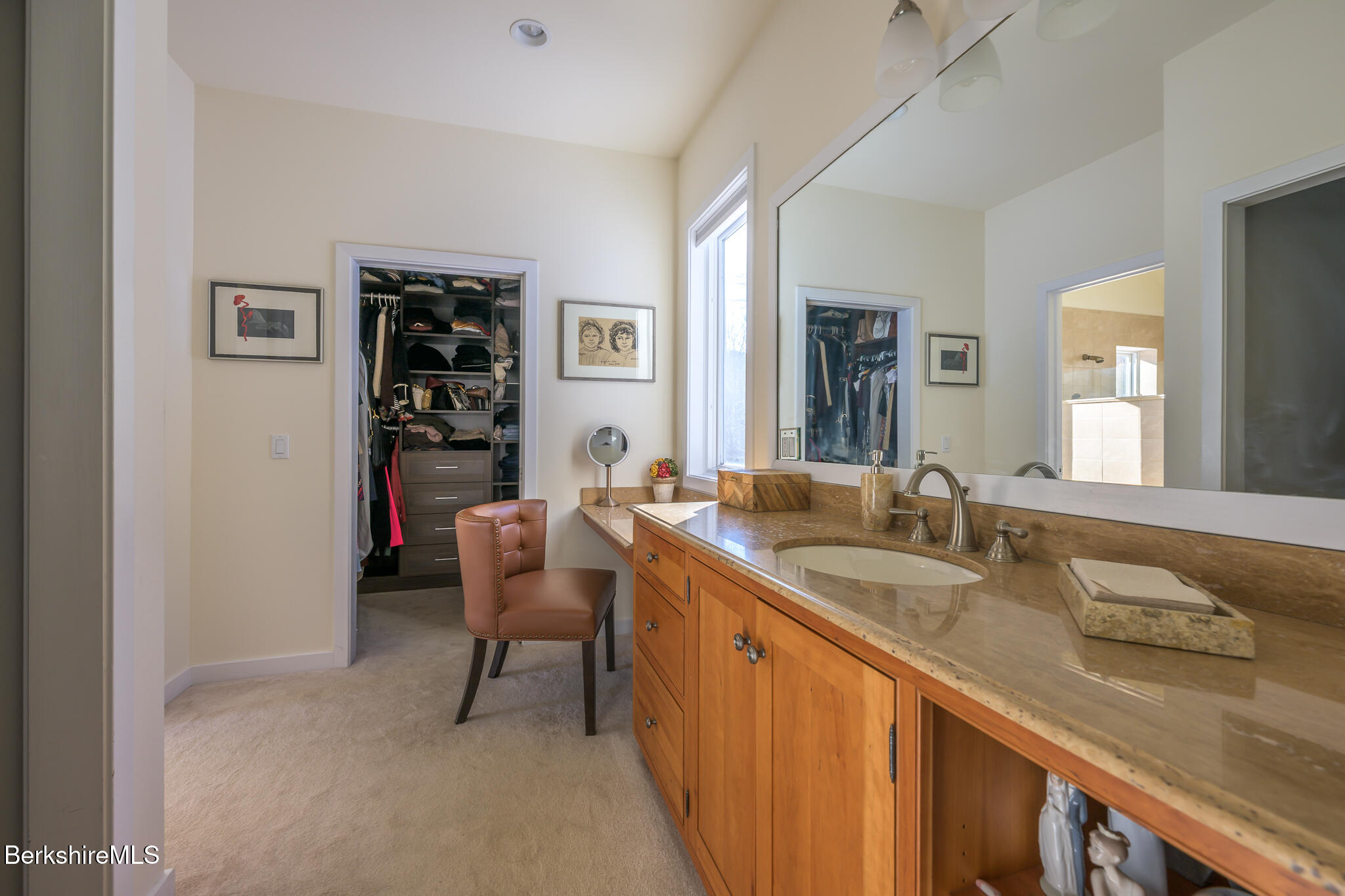 83 Maple Hill Road West Stockbridge, MA 01266 - Photo 37 of 86 a spacious bathroom with a granite countertop sink and a mirror