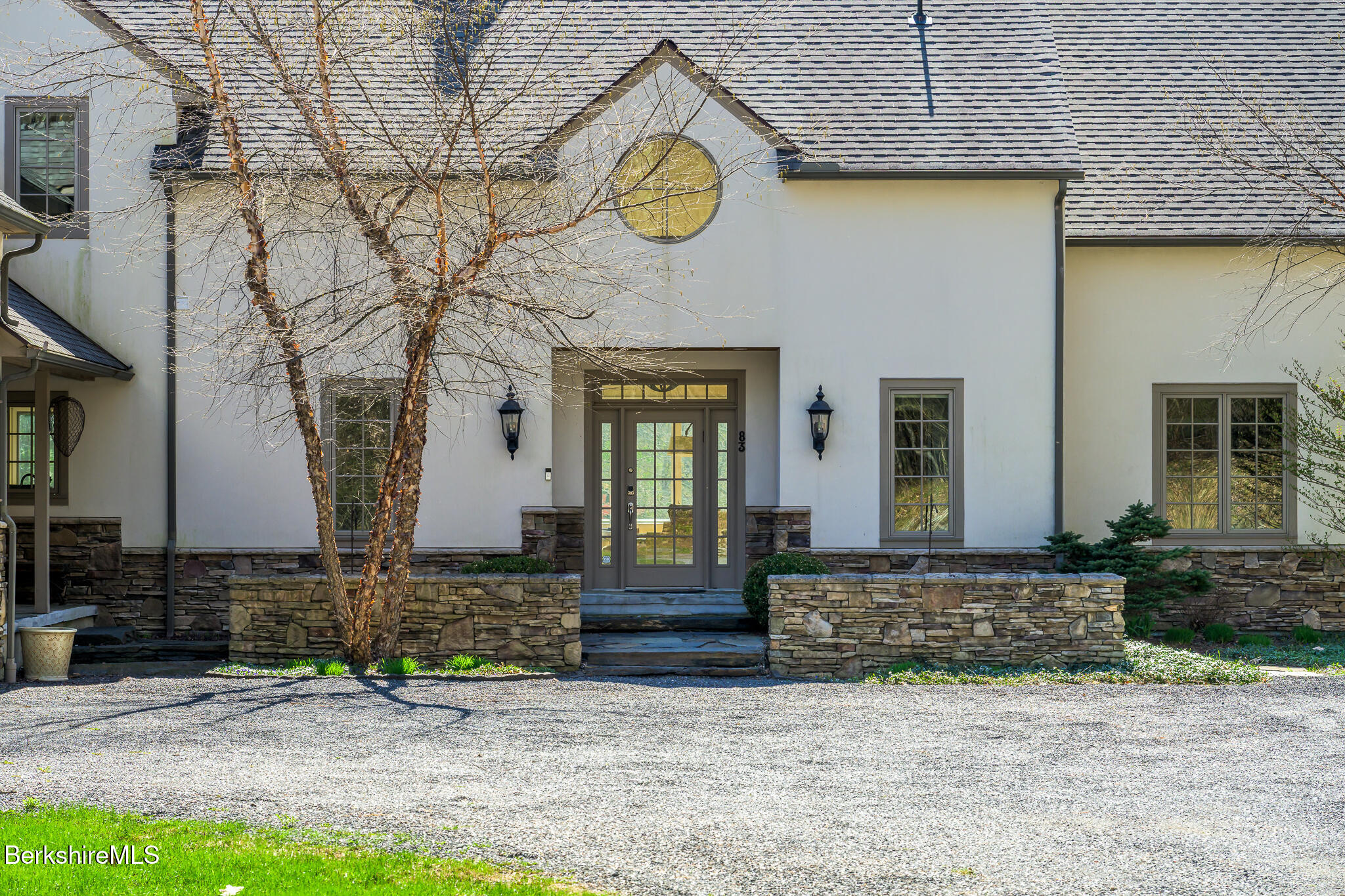 83 Maple Hill Road West Stockbridge, MA 01266 - Photo 5 of 86 a front view of a house with garden