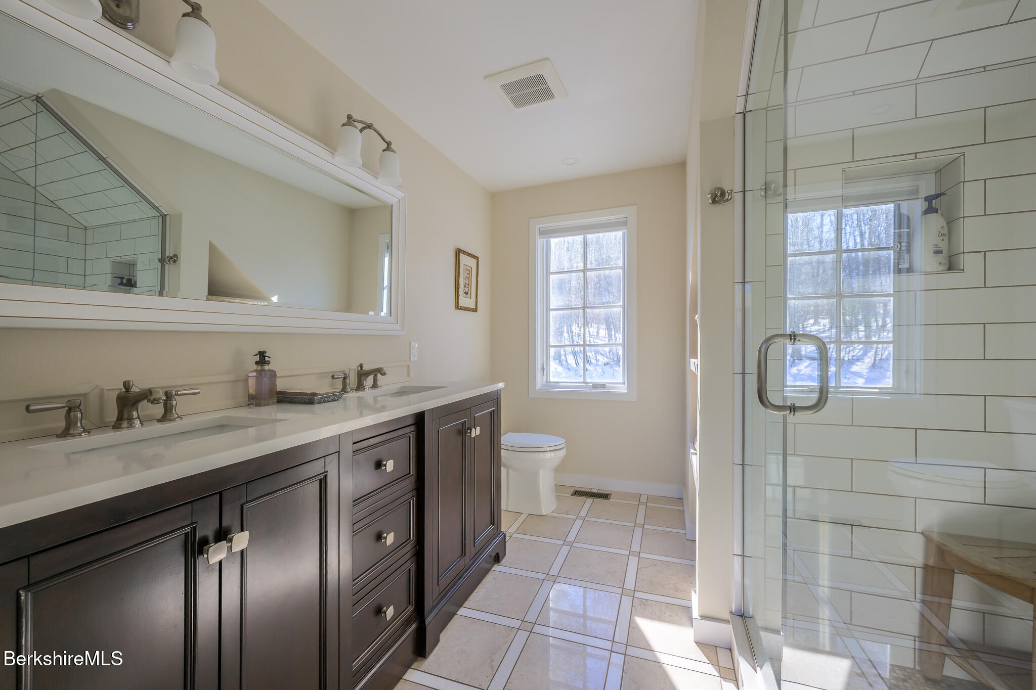 83 Maple Hill Road West Stockbridge, MA 01266 - Photo 55 of 86 a spacious bathroom with a granite countertop sink a toilet and a mirror