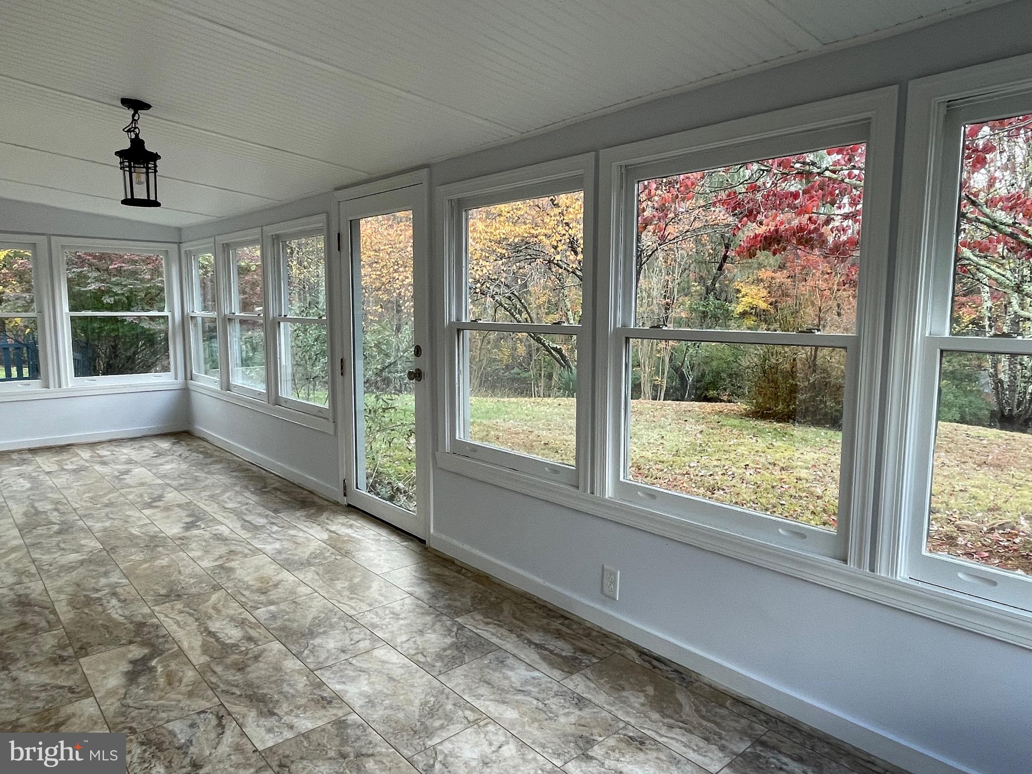 240 Whorton Hollow Road Castleton, VA 22716 - Photo 6 of 24 a view of an entryway with wooden floor