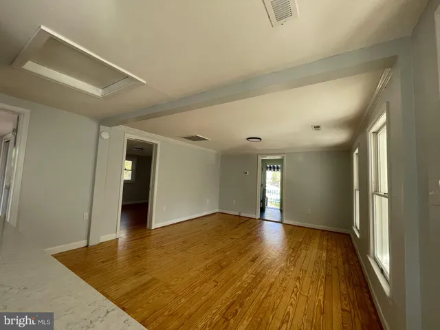 a view of an empty room and window