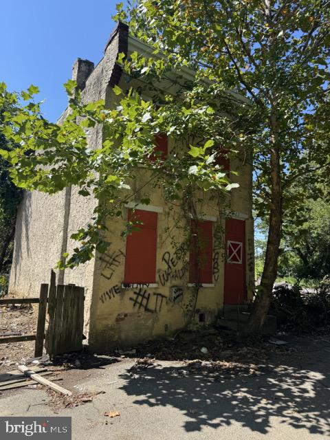a wooden fence with some trees