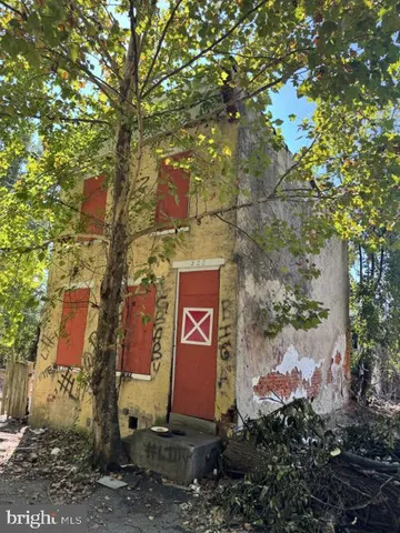 a sign that is on a brick wall