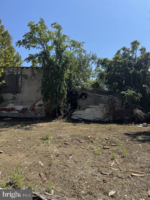 222 Byram Street Chester, PA 19013 - Photo 6 of 7 a view of a pathway with a bench