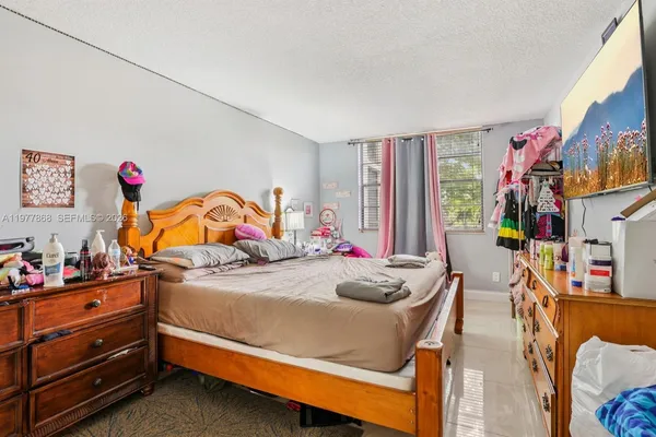 $178,900 | 6190 Woodlands Boulevard, Unit 213, Tamarac, FL 33319