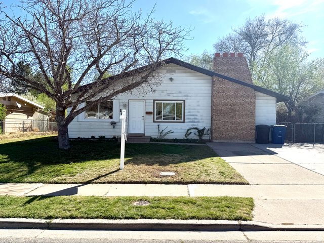 1352 North 350 West Sunset, UT 84015 - Photo 1 of 1 View of front of home featuring a chimney