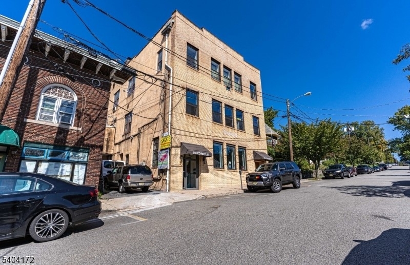 110 Cornelia Street, Unit 3 Boonton, NJ 07005 - Photo 12 of 15 a car parked in front of a building