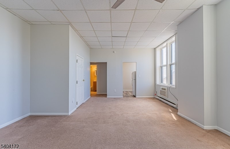 110 Cornelia Street, Unit 3 Boonton, NJ 07005 - Photo 3 of 15 an empty room with windows