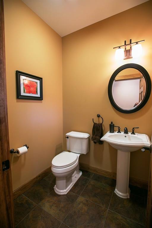 28 Blizzard Drive Newry, ME 04261 - Photo 19 of 33 A half bath located adjacent to the...