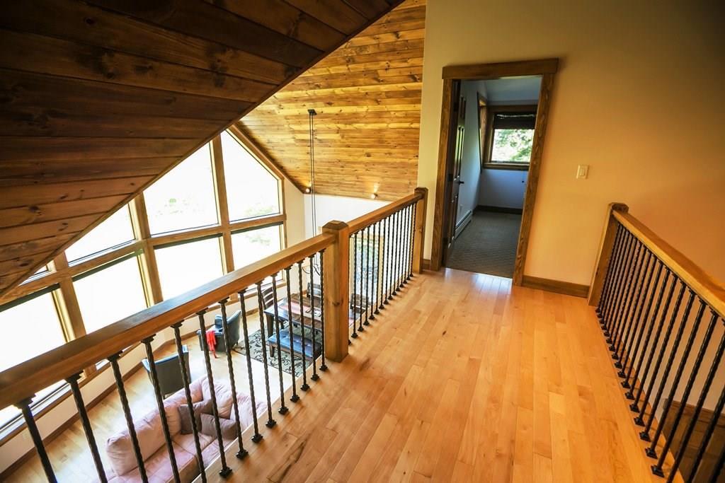 28 Blizzard Drive Newry, ME 04261 - Photo 23 of 33 Second floor balcony leads to both...