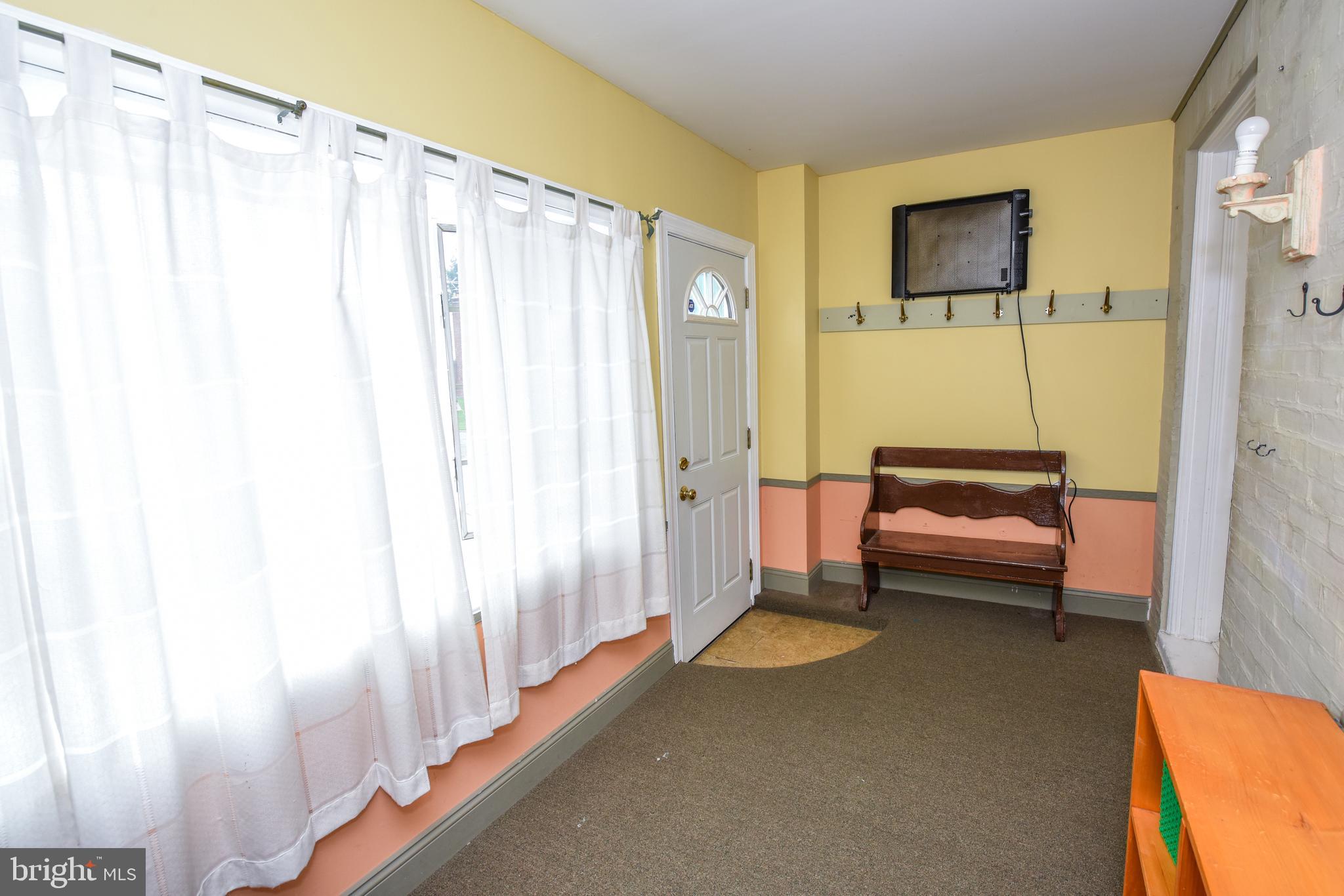 7340 Dungan Road Philadelphia, PA 19111 - Photo 5 of 38 Enclosed Front Porch / Play Room