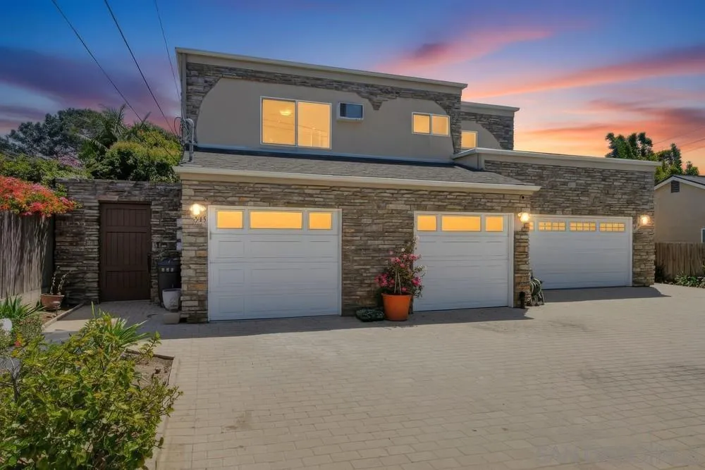 a view of a building with a garage