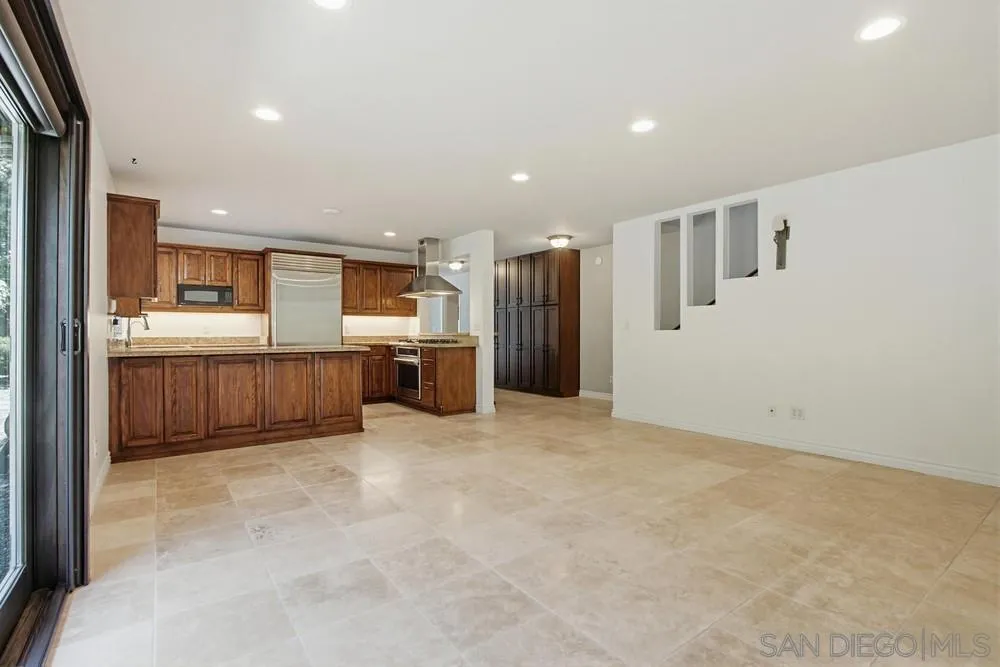 545 Bonair Way La Jolla, CA 92037 - Photo 12 of 57 a view of kitchen with refrigerator and window