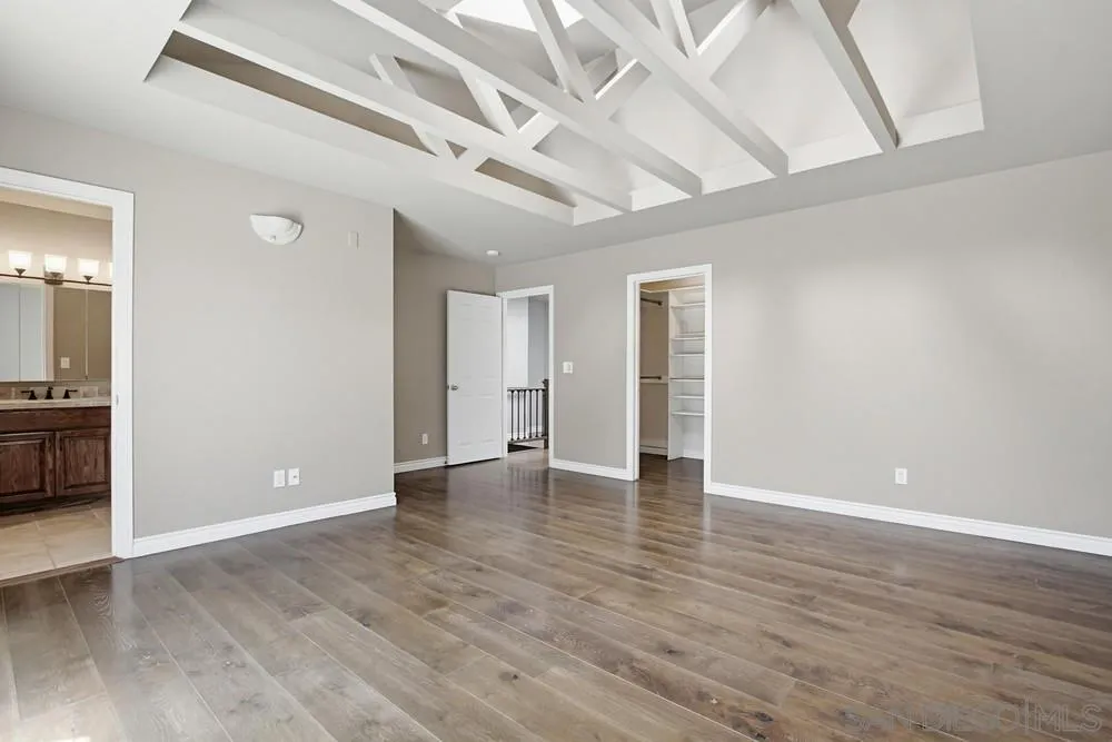 545 Bonair Way La Jolla, CA 92037 - Photo 34 of 57 wooden floor in an empty room with a window