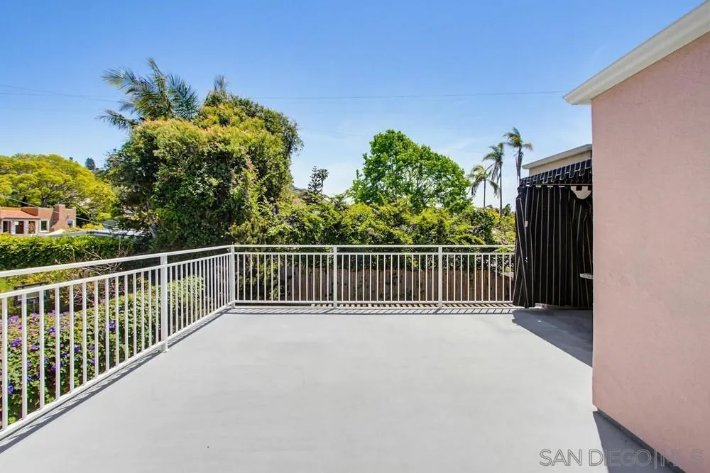 545 Bonair Way La Jolla, CA 92037 - Photo 43 of 57 a view of balcony with wooden floor and fence