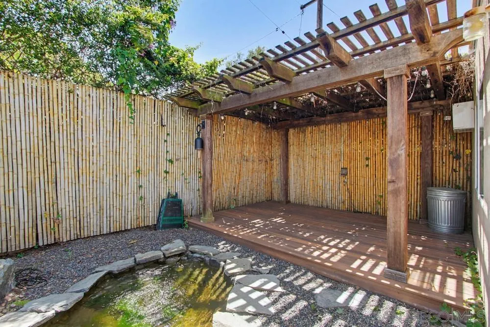 545 Bonair Way La Jolla, CA 92037 - Photo 48 of 57 a view of a backyard with wooden fence