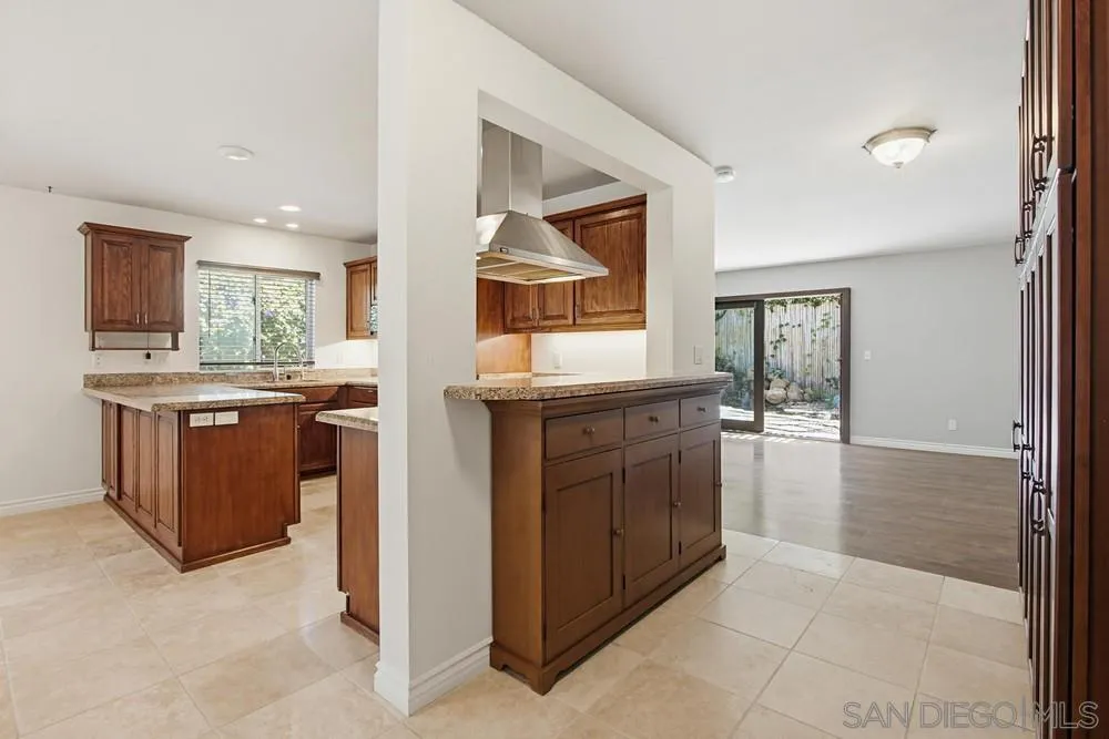 545 Bonair Way La Jolla, CA 92037 - Photo 10 of 57 a kitchen with a stove and a sink