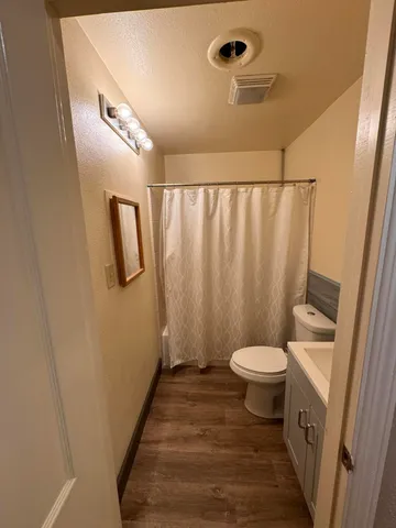 a bathroom with a bath tub and a shower