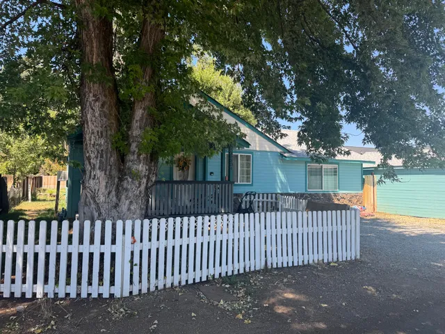 a front view of a house having yard