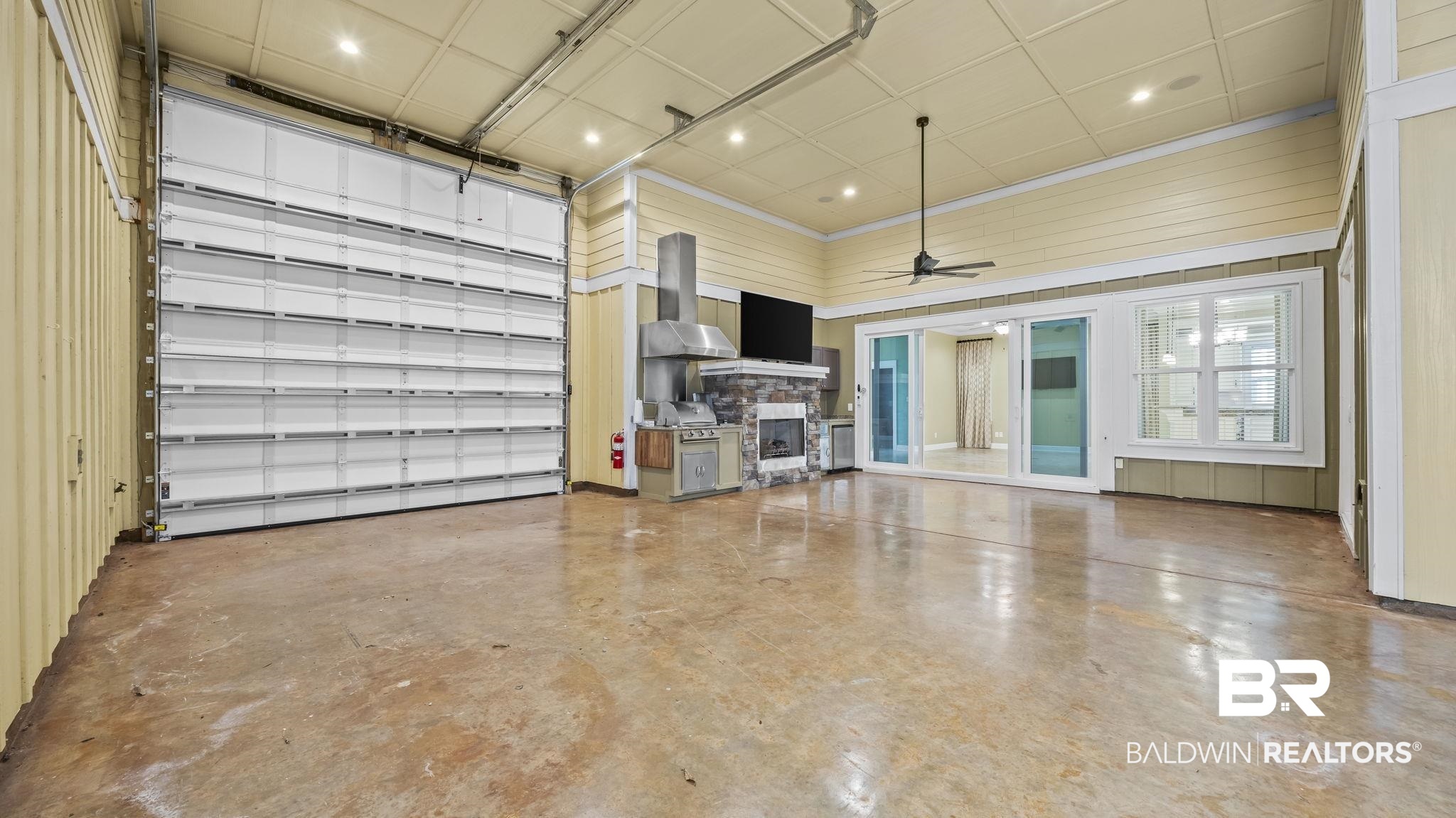 12361 Reunion Place Foley, AL 36535 - Photo 15 of 43 Garage with recessed lighting and ceiling fan
