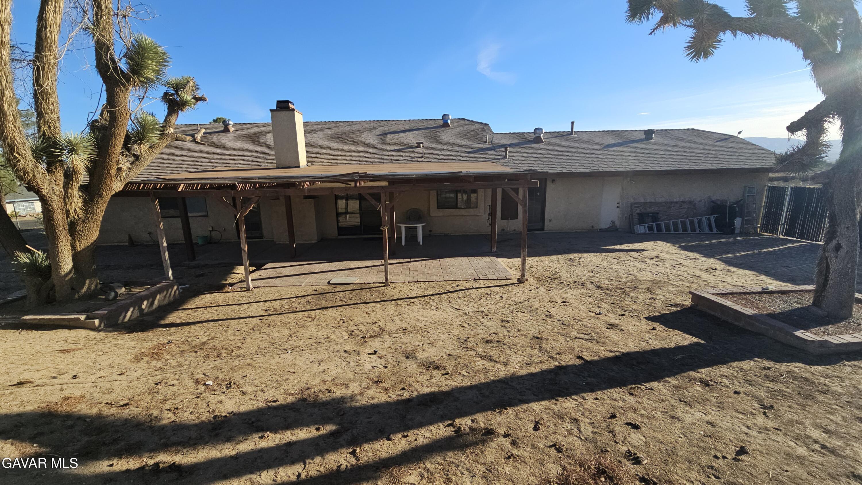 39005 161st Street East Palmdale, CA 93591 - Photo 26 of 27 a view of a house with snow on the road