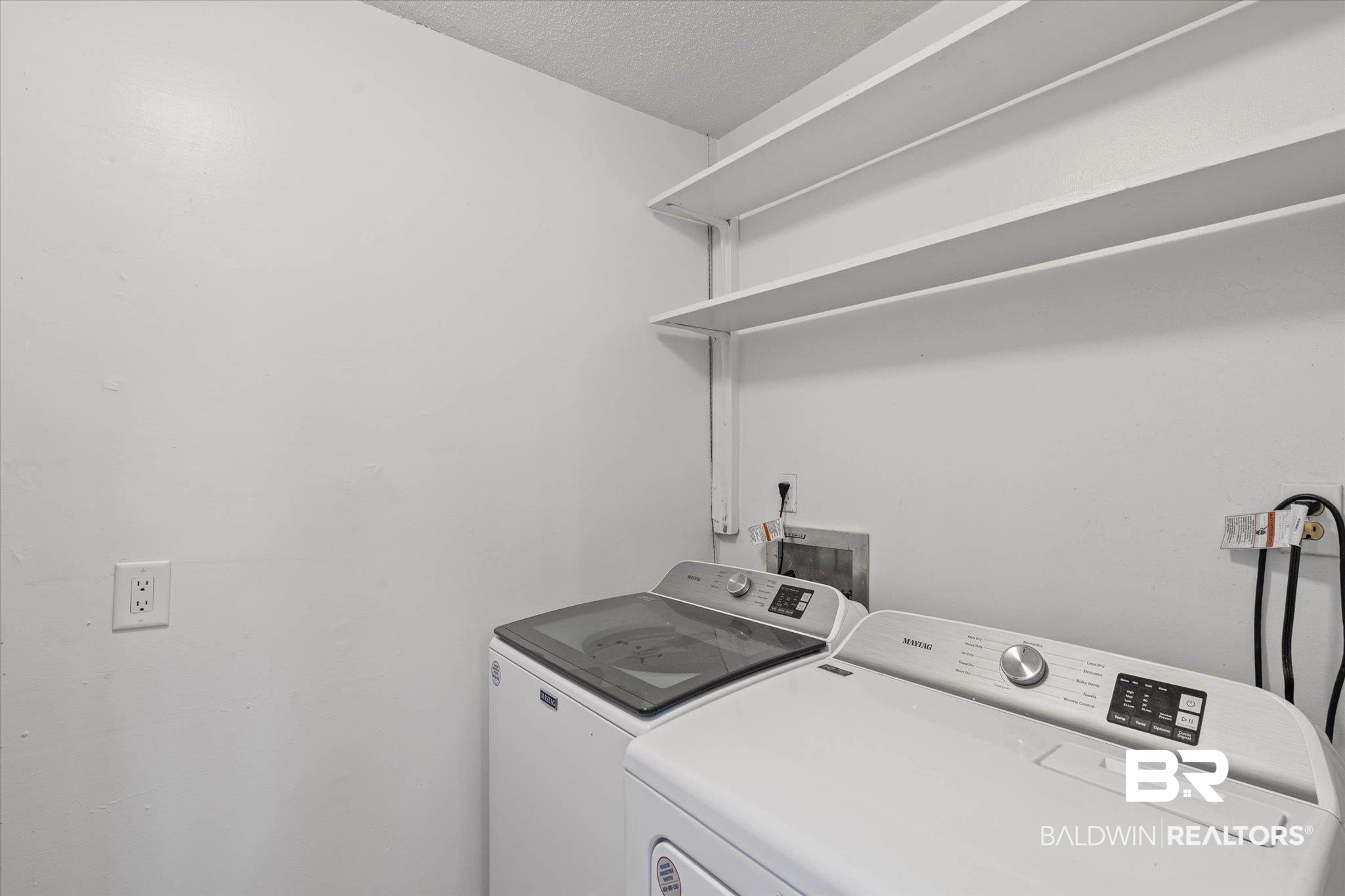 3724 Claridge Road South Mobile, AL 36608 - Photo 30 of 42 Laundry room featuring separate washer and dryer and a textured ceiling