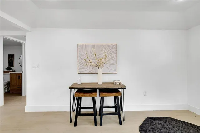 a workspace with furniture and window