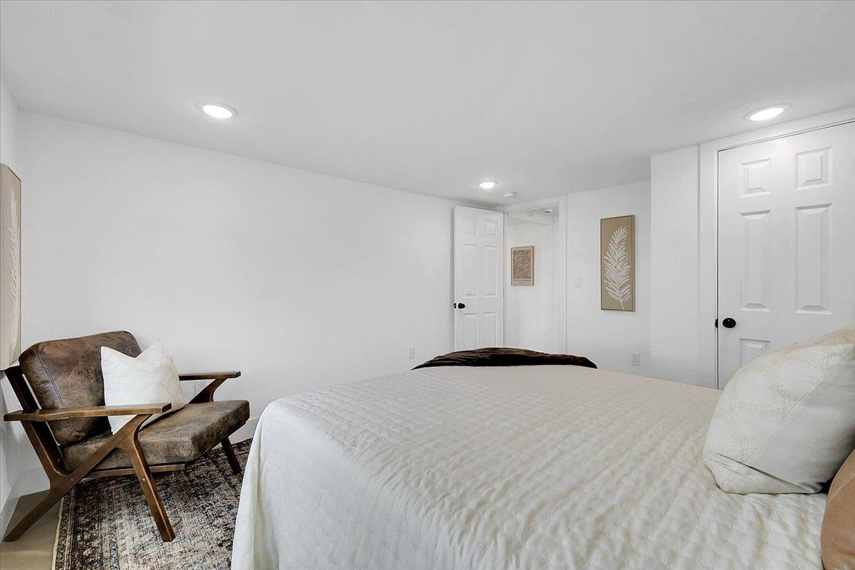 5620 Arboga Road Olivehurst, CA 95961 - Photo 21 of 42 a bedroom with a bed and chair