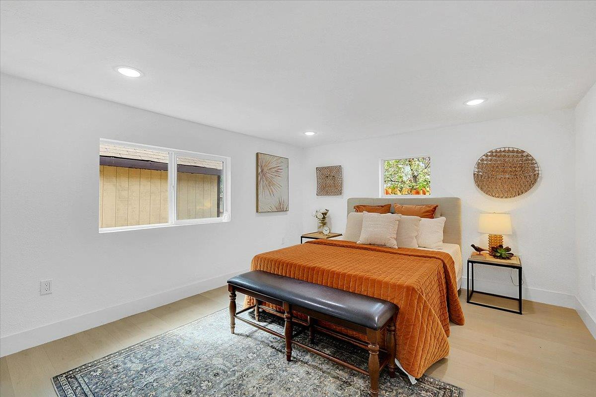 5620 Arboga Road Olivehurst, CA 95961 - Photo 23 of 42 a bedroom with a bed and a lamp on table