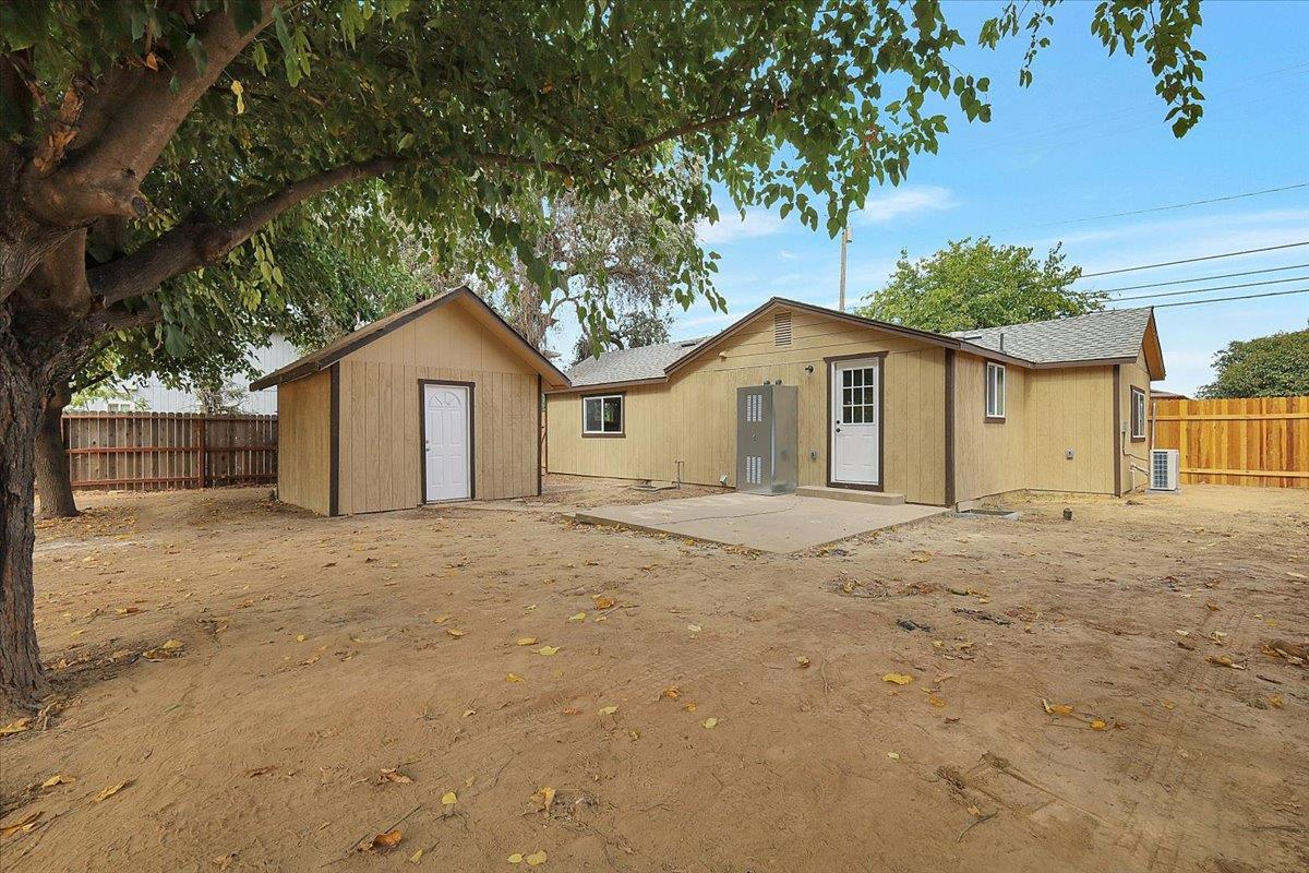 5620 Arboga Road Olivehurst, CA 95961 - Photo 27 of 42 a view of a house with a yard and garage