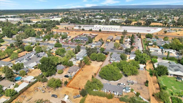 an aerial view of residential building with parking space