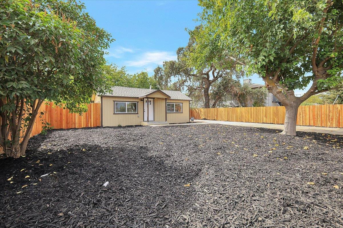 5620 Arboga Road Olivehurst, CA 95961 - Photo 6 of 42 a view of house with backyard and tree