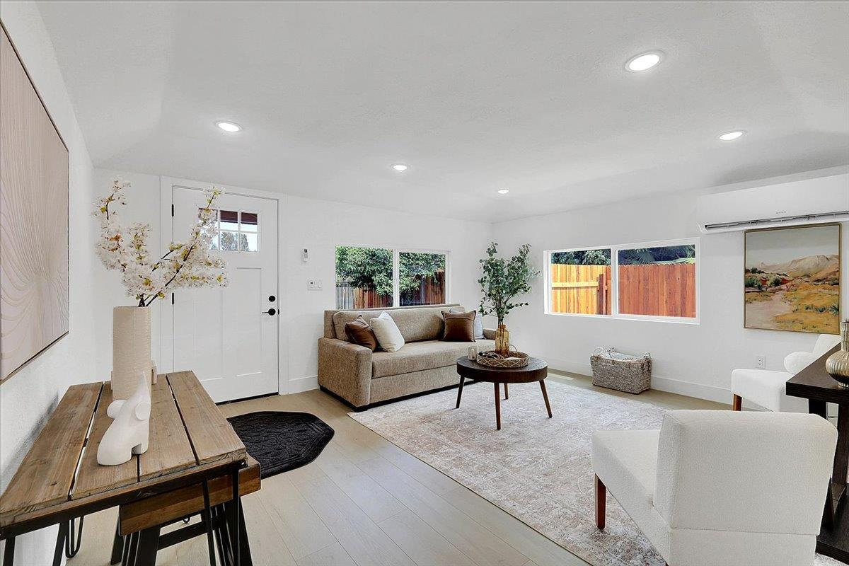 5620 Arboga Road Olivehurst, CA 95961 - Photo 9 of 42 a living room with furniture and a flat screen tv