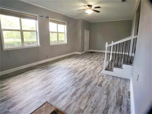 a view of entryway with wooden floor