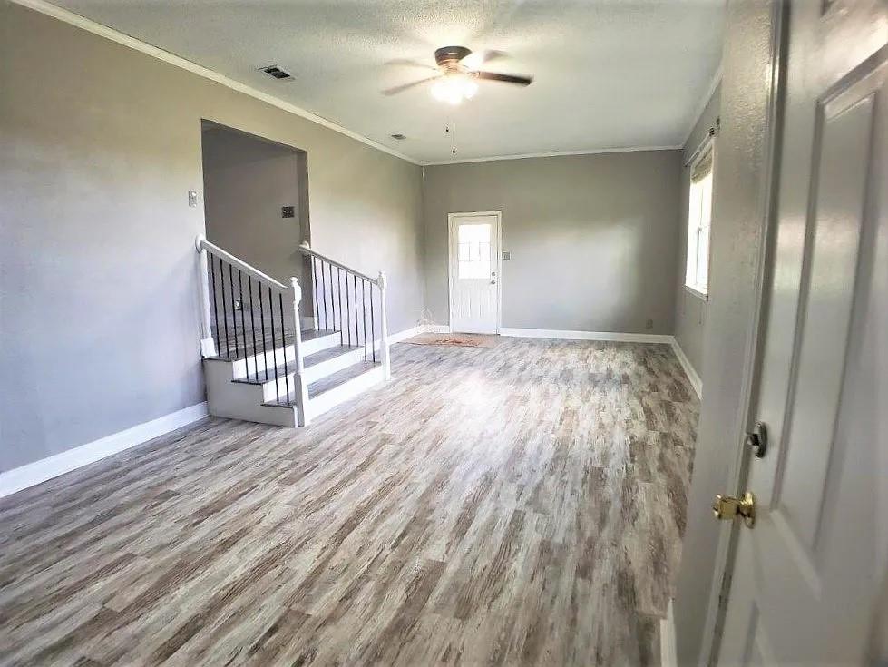 1168 Preston Meadows Road Sherman, TX 75092 - Photo 8 of 20 wooden floor in an empty room with a window