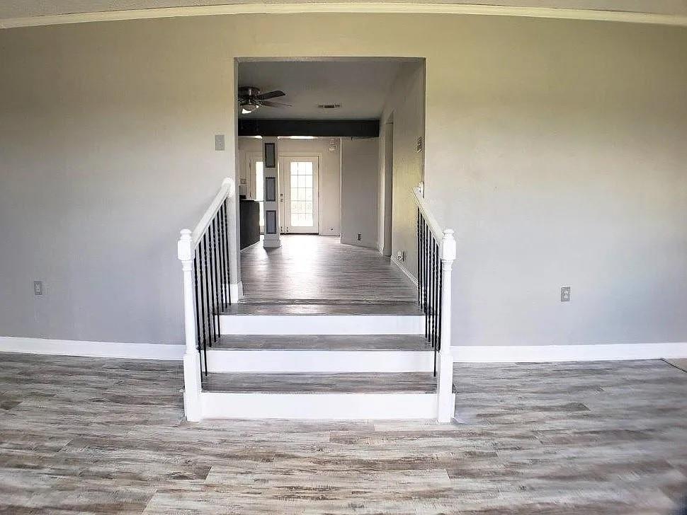 1168 Preston Meadows Road Sherman, TX 75092 - Photo 10 of 20 a view of entryway and hall with wooden floor