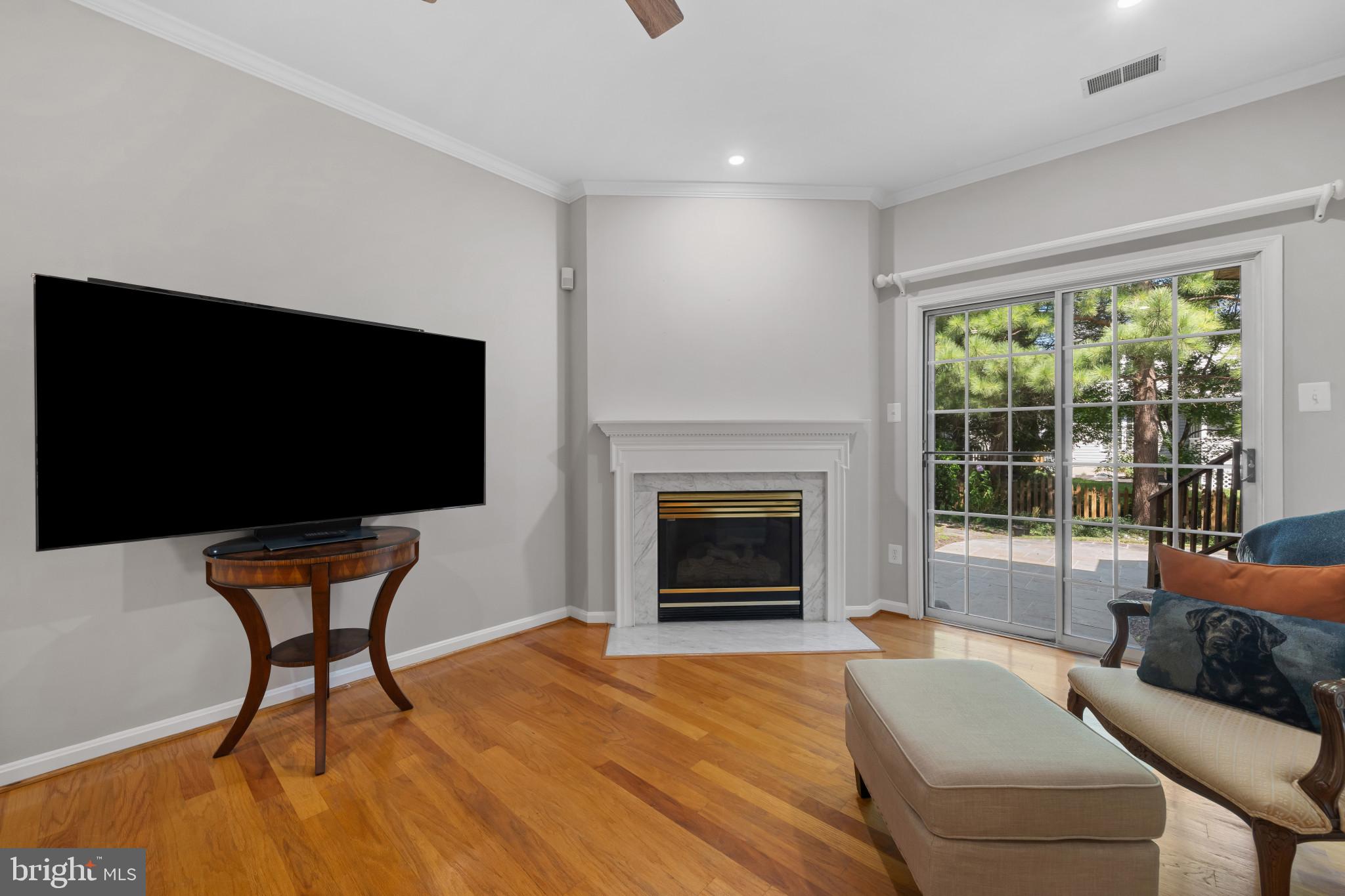 2603 Spartan Road Olney, MD 20832 - Photo 17 of 62 a living room with furniture and a flat screen tv