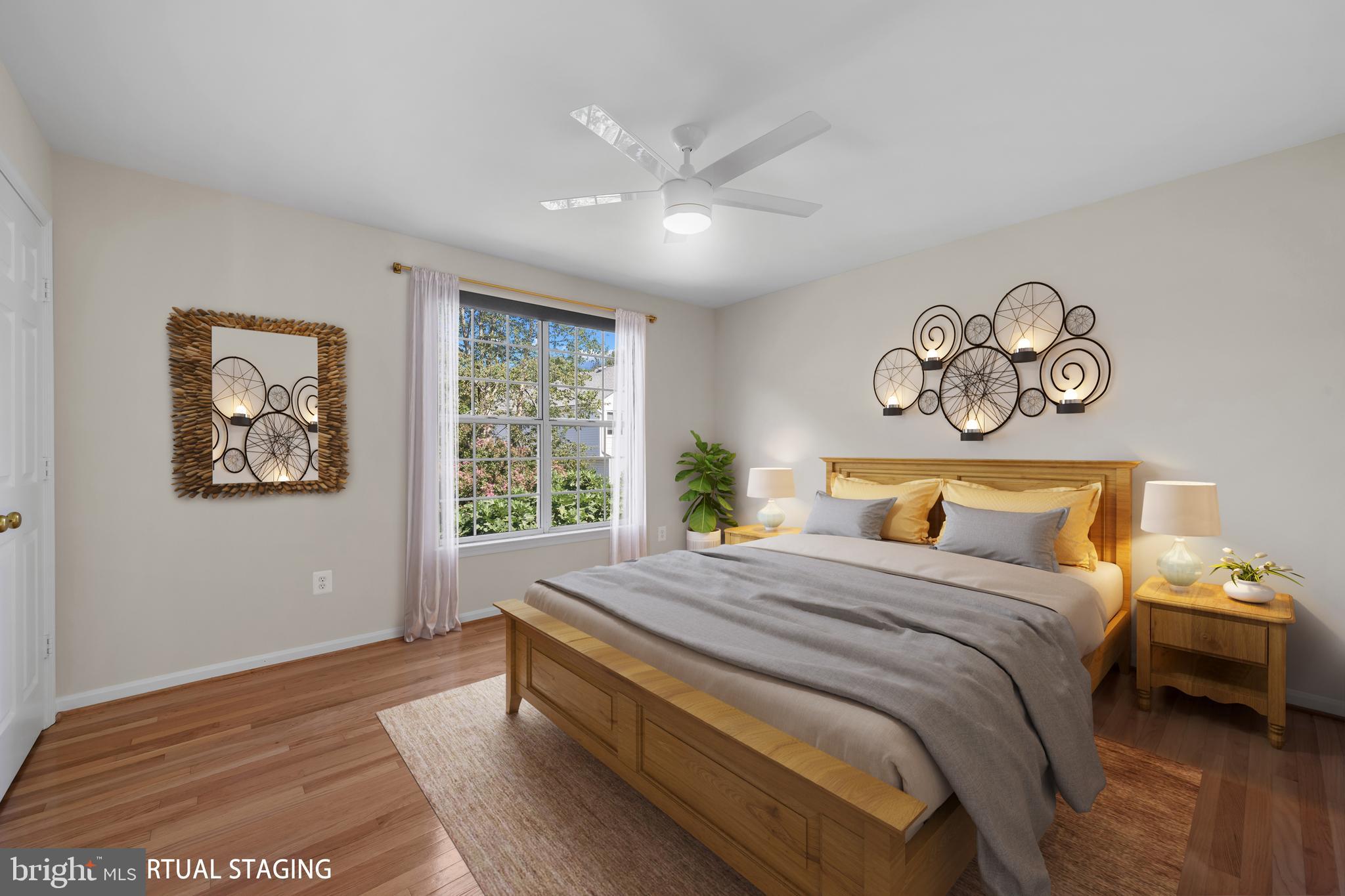 2603 Spartan Road Olney, MD 20832 - Photo 35 of 62 a bedroom with a large bed and a window