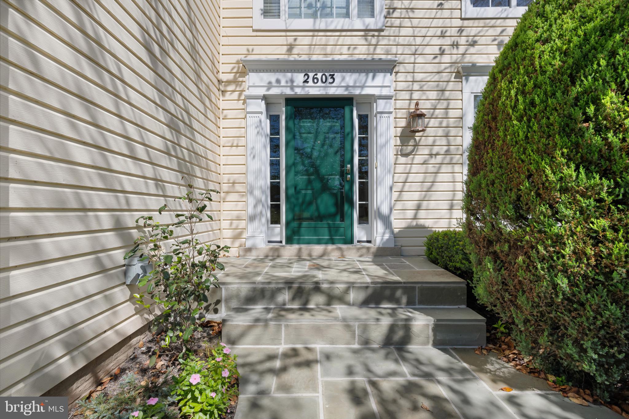 2603 Spartan Road Olney, MD 20832 - Photo 4 of 62 a front view of a house with a yard
