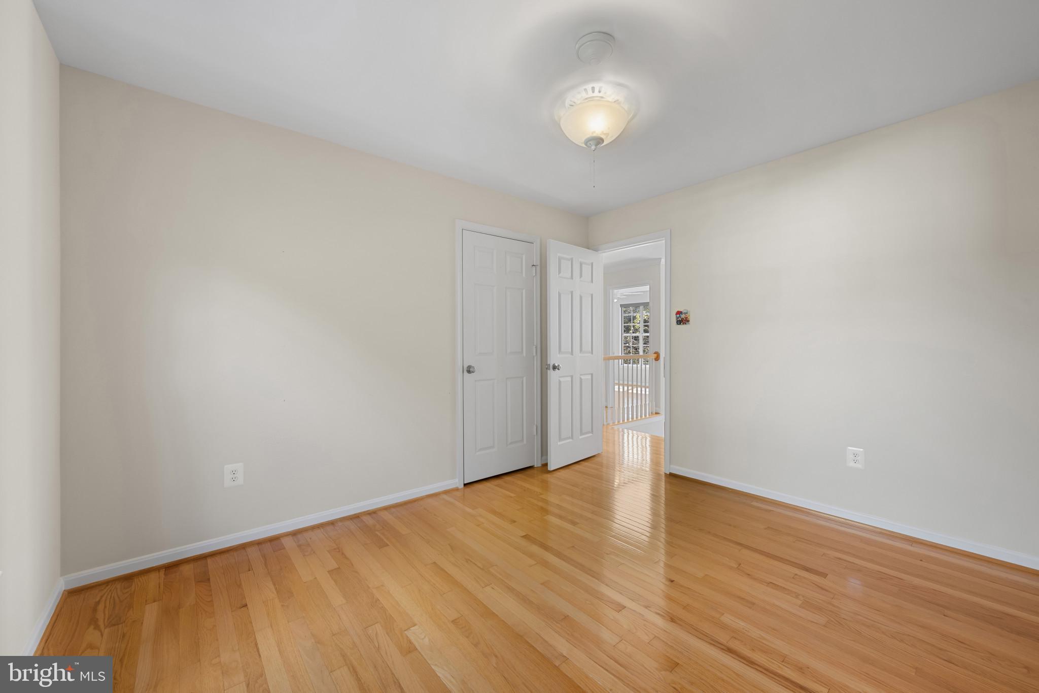 2603 Spartan Road Olney, MD 20832 - Photo 41 of 62 a view of an empty room with wooden floor