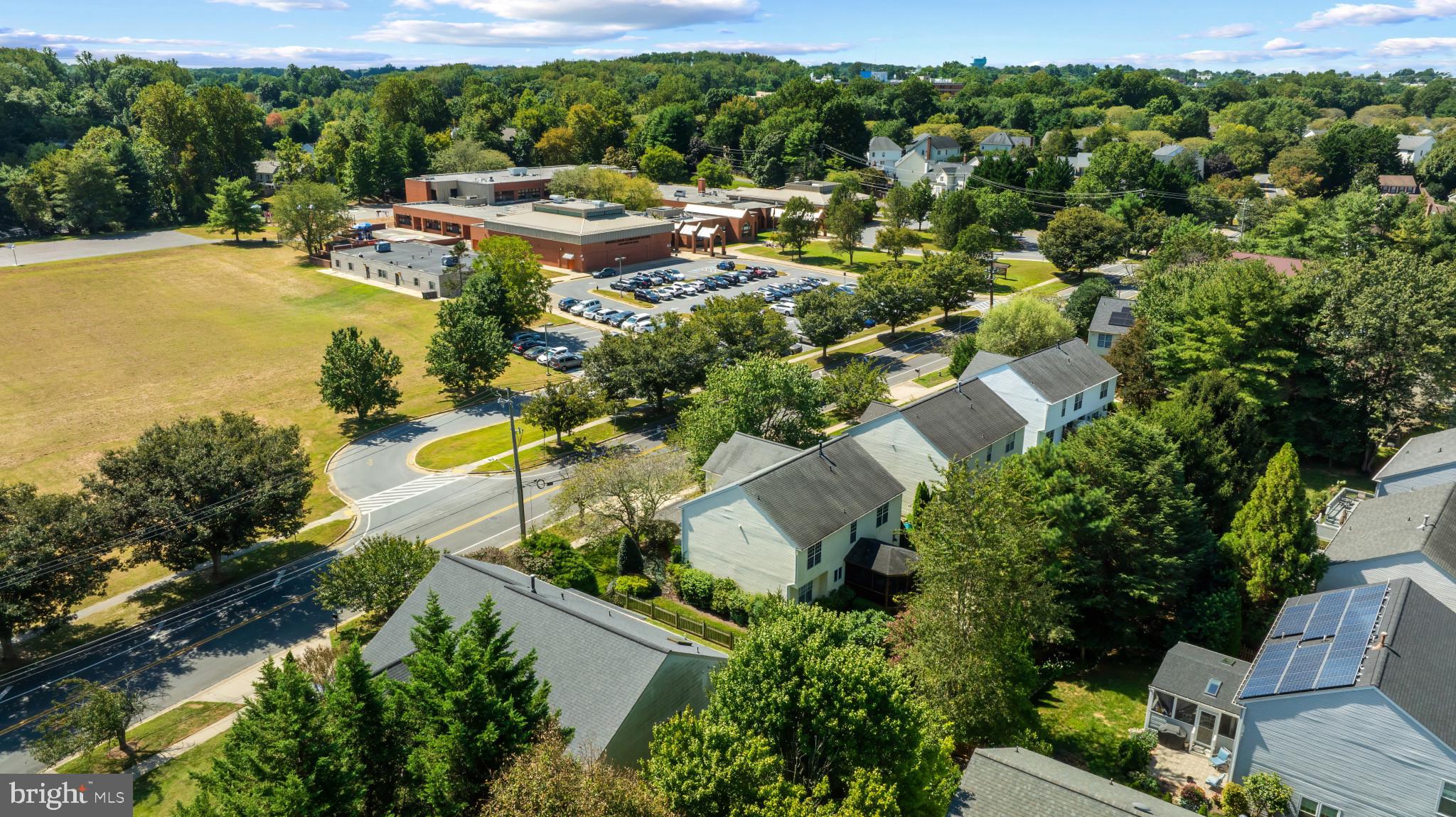 2603 Spartan Road Olney, MD 20832 - Photo 59 of 62 an aerial view of residential houses with outdoor space and swimming pool